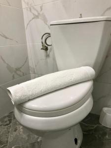 Koupelna v ubytování Joy Hotel