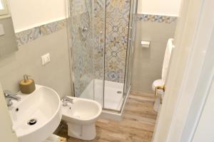 A bathroom at Modarno Exclusive Apartments