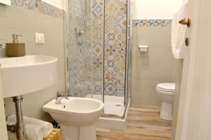 A bathroom at Modarno Exclusive Apartments