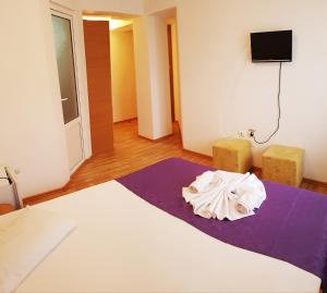 Postel nebo postele na pokoji v ubytování Casa CIC