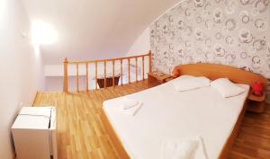 Postel nebo postele na pokoji v ubytování Casa CIC