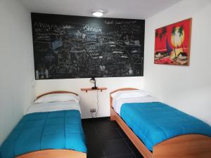 Ein Bett oder Betten in einem Zimmer der Unterkunft Garibaldina