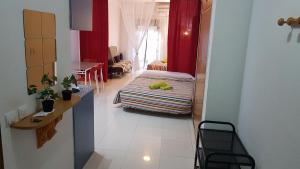 A bed or beds in a room at Estudio Las Huertas