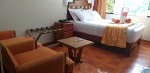 Voodi või voodid majutusasutuse Hostal Vista Waynapata 123 toas