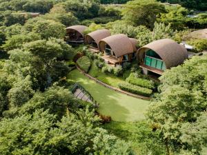an aerial view of a house in the forest at Andaz Costa Rica Resort at Peninsula Papagayo – A concept by Hyatt in Culebra