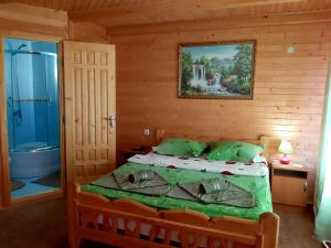 Кровать или кровати в номере Girska Sonata Hotel & Apartments