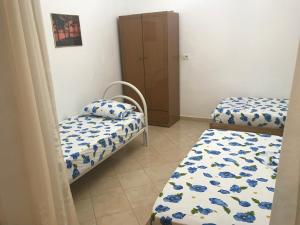 Cama o camas de una habitación en Emili Apartment