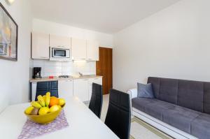 Kuchyň nebo kuchyňský kout v ubytování Apartments Mikanović