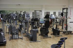 a gym filled with lots of exercise equipment at Mobile home Lučan in Drage