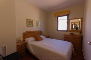 Postel nebo postele na pokoji v ubytování INNOUTHOME Duplex Valls + 65 fotografií