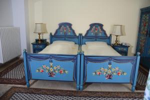 Postel nebo postele na pokoji v ubytování Hotel Das Schlössl