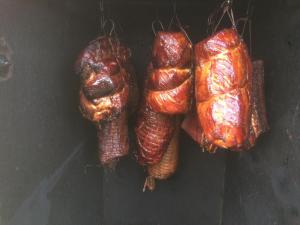 two lobes of food are hanging on a table at Dom w Sąpach in Sąpy