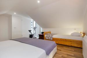 Postel nebo postele na pokoji v ubytování Apartment Betina Inn