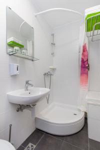 Koupelna v ubytování Apartment Betina Inn + 24 fotografií