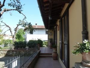 En balkon eller terrasse på La Casina Appartamento nel Cuore di Greve in Chianti