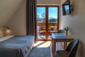 Postel nebo postele na pokoji v ubytování Apartamenty, pokoje PRZY TERMACH - 70 m Termy Szaflary, 150 m Gorący Potok