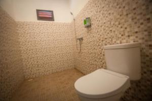 Koupelna v ubytování Japa Bungalow + 28 fotografií