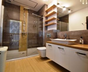 Kúpeľňa v ubytovaní Ferienwohnung Kisajno + 22 fotografií