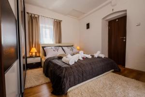 Posteľ alebo postele v izbe v ubytovaní Central Apartment Castle Cippico