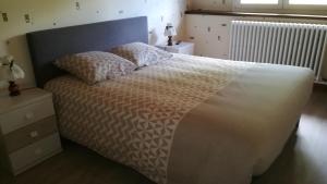 Vuode tai vuoteita majoituspaikassa Gîte de Bellevue Maison Traditionnelle Vosgienne