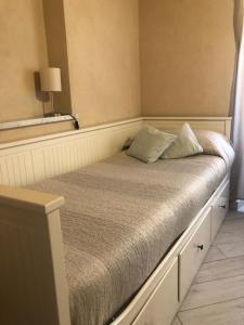 a bed in a room with at Mansarda 5 terre in Monterosso al Mare