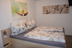 Cama ou camas em um quarto em Ferienwohnung Albel
