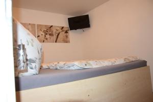 Ein Bett oder Betten in einem Zimmer der Unterkunft Ferienwohnung Albel