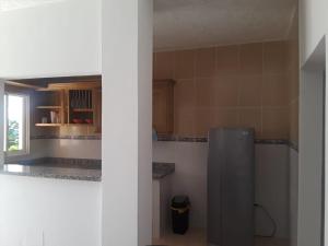 Kuchyň nebo kuchyňský kout v ubytování Apartamentos Nuevo Amanecer