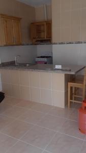 Kuchyň nebo kuchyňský kout v ubytování Apartamentos Nuevo Amanecer