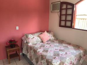 Postel nebo postele na pokoji v ubytování Casa caiçara