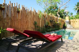 Bazén v ubytování De Rekun Ubud nebo v jeho okolí