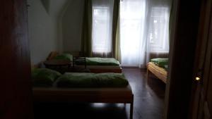 Postel nebo postele na pokoji v ubytování U Žabky
