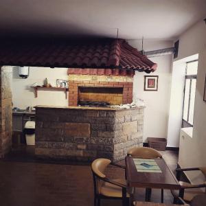 Kuchyň nebo kuchyňský kout v ubytování Buffet M Apartments and Rooms Obrovac