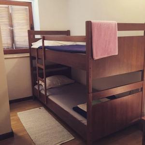 Postel nebo postele na pokoji v ubytování Buffet M Apartments and Rooms Obrovac