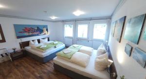 Ein Bett oder Betten in einem Zimmer der Unterkunft Quartier SansSouci Hostel