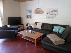 Χώρος καθιστικού στο Ferienhaus am Fleesensee