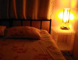 Letto o letti in una camera di The Kong