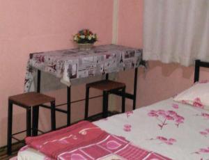 Letto o letti in una camera di The Kong