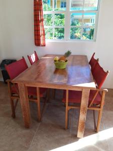 Area soggiorno di Mango Garden Cottages