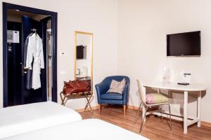 Postel nebo postele na pokoji v ubytování Hotel Oro Blu