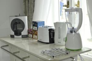 Príslušenstvo na prípravu kávy alebo čaju v ubytovaní Apartment Arum-Lily
