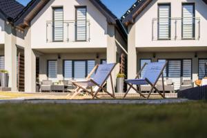 Zdjęcie z galerii obiektu Domki Nord Breeze z podgrzewanym basenem i jacuzzi we Władysławowie