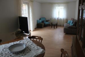 Posezení v ubytování Ferienhaus Storchennest