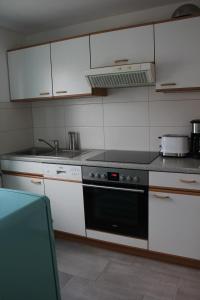 Kuchyň nebo kuchyňský kout v ubytování Ferienhaus Storchennest