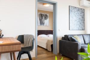 Postel nebo postele na pokoji v ubytování Viru Väljak Lux Apartment