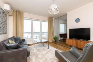 TV a/nebo společenská místnost v ubytování Viru Väljak Lux Apartment