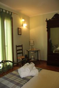 Postel nebo postele na pokoji v ubytování B&B Il Giardino