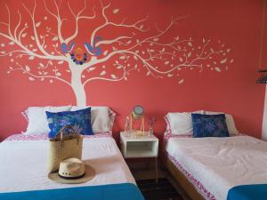 Postel nebo postele na pokoji v ubytování Azul Cielo Hostel