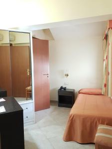 Postel nebo postele na pokoji v ubytování Hotel Orizzonte
