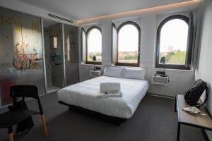 Postel nebo postele na pokoji v ubytování Hotel Melibea by gaiarooms